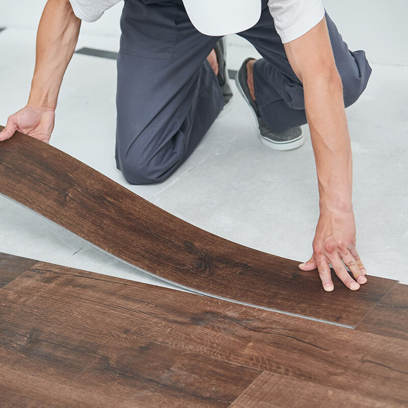 Luxury vinyl flooring being installed | The L&L Company